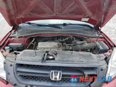 Zdjęcie 12 z 14 samochodu: 2004 HONDA PILOT EXL VIN:2HKYF18514H588930 - miniatura