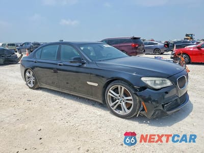 Czwarte zdjęcie samochodu z boku: 2013 BMW 750 LI VIN:WBAYE8C54DDE22135 - miniatura