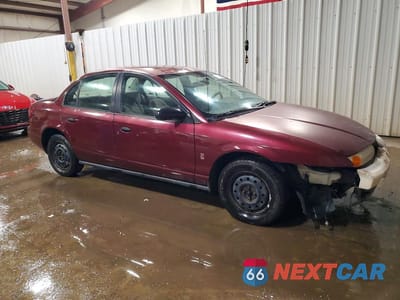 Czwarte zdjęcie samochodu z boku: 2002 SATURN SL1 VIN:1G8ZH54862Z257153 - miniatura