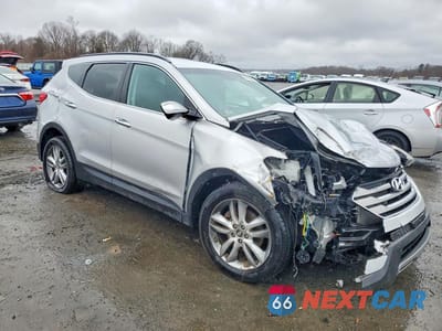 Czwarte zdjęcie samochodu z boku: 2013 HYUNDAI SANTA FE SPORT 2.0T VIN:5XYZUDLA2DG084720 - miniatura