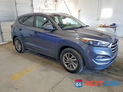 Czwarte zdjęcie samochodu z boku: 2016 HYUNDAI TUCSON SE VIN:KM8J33A47GU207420 - miniatura