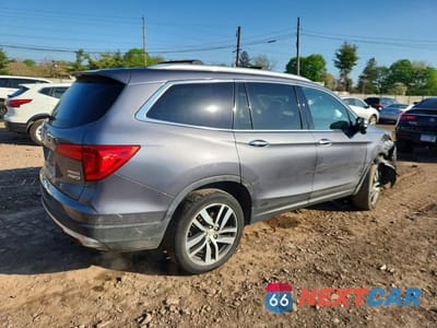 Trzecie zdjęcie samochodu z tyłu: 2016 HONDA PILOT TOURING VIN:5FNYF6H91GB101583 - miniatura