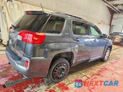 Trzecie zdjęcie samochodu z tyłu: 2017 GMC TERRAIN SLE VIN:2GKFLTE31H6137638 - miniatura