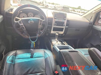 Zdjęcie 8 z 12 samochodu: 2014 NISSAN TITAN PRO-4X VIN:1N6BA0EC3EN508866 - miniatura