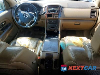 Zdjęcie 8 z 14 samochodu: 2004 HONDA PILOT VIN:2HKYF18674H512086 - miniatura