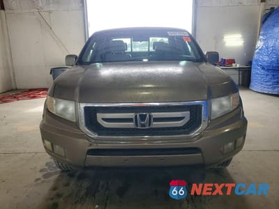 Piąte zdjęcie samochodu w środku: 2009 HONDA RIDGELINE RTL VIN:2HJYK16519H502767 - miniatura