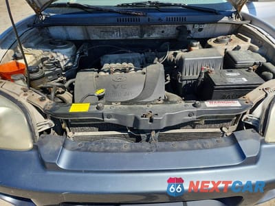Zdjęcie 12 z 13 samochodu: 2001 HYUNDAI SANTA FE GL VIN:KM8SC83D61U021549 - miniatura