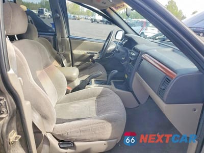 Zdjęcie 7 z 12 samochodu: 1999 JEEP GRAND CHEROKEE LAREDO VIN:1J4GW58N9XC804505 - miniatura