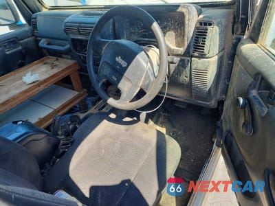 Zdjęcie 8 z 12 samochodu: 2004 JEEP WRANGLER / TJ SPORT VIN:1J4F449S34P802463 - miniatura