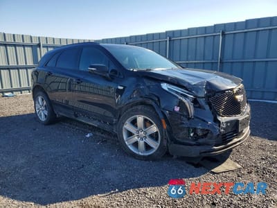 Czwarte zdjęcie samochodu z boku: 2021 CADILLAC XT5 SPORT VIN:1GYKNGRS1MZ105522 - miniatura