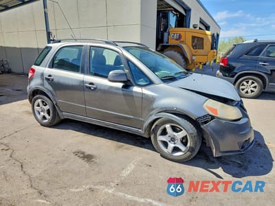 Czwarte zdjęcie samochodu z boku: 2010 SUZUKI SX4 VIN:JS2YA5A3XA6300705 - miniatura