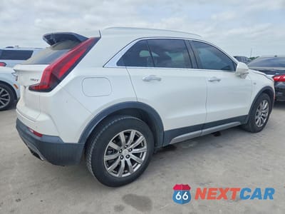 Trzecie zdjęcie samochodu z tyłu: 2019 CADILLAC XT4 PREMIUM LUXURY VIN:1GYFZCR44KF211736 - miniatura