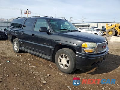 Czwarte zdjęcie samochodu z boku: 2004 GMC YUKON XL DENALI VIN:1GKFK66U54J163345 - miniatura