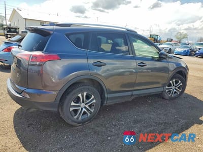 Trzecie zdjęcie samochodu z tyłu: 2018 TOYOTA RAV4 LE VIN:JTMBFREV8JJ730976 - miniatura