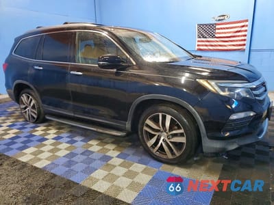Czwarte zdjęcie samochodu z boku: 2016 HONDA PILOT ELITE VIN:5FNYF6H00GB075821 - miniatura