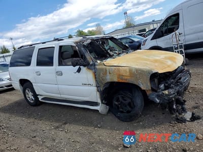 Czwarte zdjęcie samochodu z boku: 2003 GMC YUKON XL DENALI VIN:1GKFK66U83J281632 - miniatura