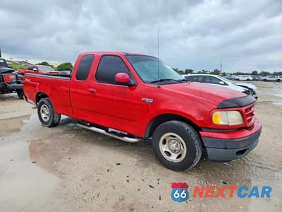 Czwarte zdjęcie samochodu z boku: 2002 FORD F150 VIN:1FTRX172X2NB10981 - miniatura