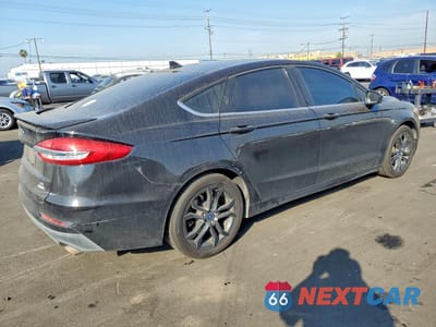 Trzecie zdjęcie samochodu z tyłu: 2019 FORD FUSION SE VIN:3FA6P0HD0KR177394 - miniatura