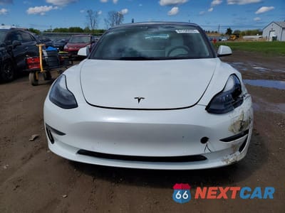 Piąte zdjęcie samochodu w środku: 2022 TESLA MODEL 3 VIN:5YJ3E1EB9NF110908 - miniatura
