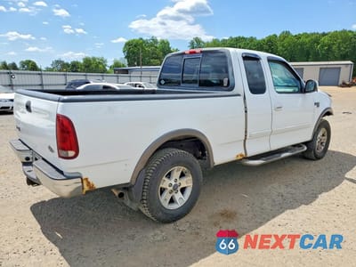 Trzecie zdjęcie samochodu z tyłu: 2002 FORD F150 VIN:1FTRX18W62NA55852 - miniatura