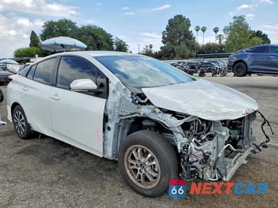 Czwarte zdjęcie samochodu z boku: 2022 TOYOTA PRIUS PRIME XLE VIN:JTDKAMFP5N3223822 - miniatura