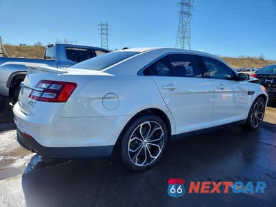Trzecie zdjęcie samochodu z tyłu: 2015 FORD TAURUS SHO VIN:1FAHP2KT3FG172904 - miniatura
