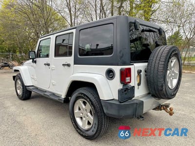 Trzecie zdjęcie samochodu z tyłu: 2015 JEEP WRANGLER UNLIMITED SAHARA VIN:1C4BJWEGXFL540381 - miniatura