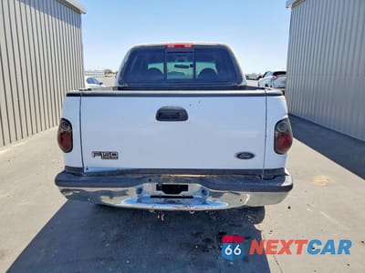 Zdjęcie 6 z 12 samochodu: 2001 FORD F150 SUPERCREW VIN:1FTRW07L11KE61610 - miniatura