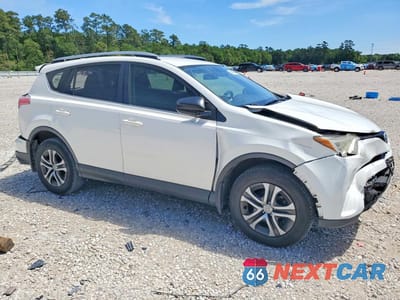 Czwarte zdjęcie samochodu z boku: 2018 TOYOTA RAV4 LE VIN:JTMZFREV3JJ156771 - miniatura