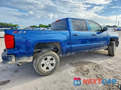 Trzecie zdjęcie samochodu z tyłu: 2018 CHEVROLET SILVERADO K1500 LT VIN:3GCUKREC9JG423675 - miniatura