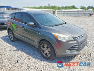 Czwarte zdjęcie samochodu z boku: 2014 FORD ESCAPE SE VIN:1FMCU0GX0EUB97641 - miniatura