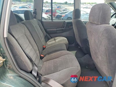 Zdjęcie 11 z 14 samochodu: 1998 JEEP GRAND CHEROKEE LAREDO VIN:1J4FX58S7WC317266 - miniatura
