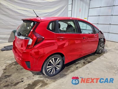 Trzecie zdjęcie samochodu z tyłu: 2016 HONDA FIT EX VIN:JHMGK5H74GS007666 - miniatura