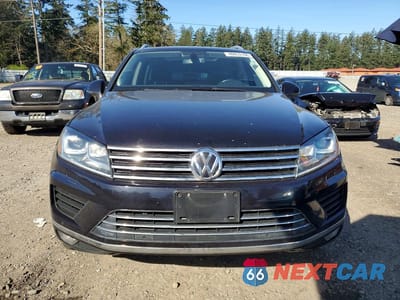 Piąte zdjęcie samochodu w środku: 2015 VOLKSWAGEN TOUAREG V6 TDI VIN:WVGEP9BP8FD005699 - miniatura
