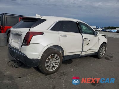 Trzecie zdjęcie samochodu z tyłu: 2017 CADILLAC XT5 LUXURY VIN:1GYKNBRS0HZ122403 - miniatura