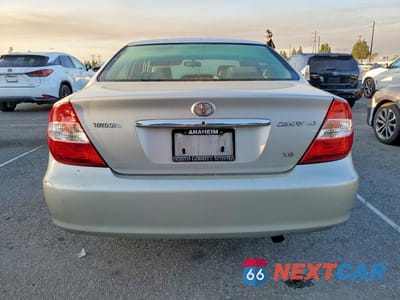 Zdjęcie 6 z 11 samochodu: 2004 TOYOTA CAMRY LE V6 VIN:4T1BF32K54U079683 - miniatura