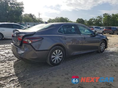 Trzecie zdjęcie samochodu z tyłu: 2023 TOYOTA CAMRY HYBRID LE VIN:4T1C31AK3PU606921 - miniatura