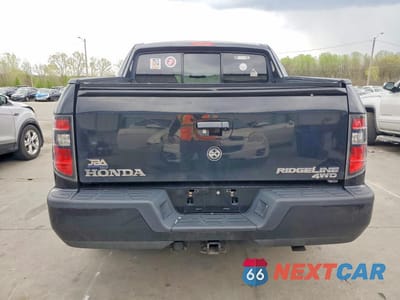 Zdjęcie 6 z 13 samochodu: 2013 HONDA RIDGELINE SPORT VIN:5FPYK1F70DB017970 - miniatura