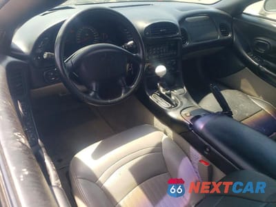 Zdjęcie 8 z 12 samochodu: 2004 CHEVROLET CORVETTE VIN:1G1YY22G845118199 - miniatura