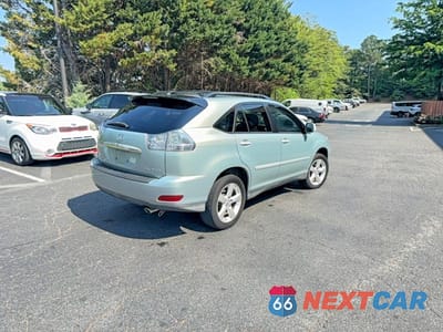 Czwarte zdjęcie samochodu z boku: 2007 LEXUS RX 350 VIN:2T2HK31U57C036987 - miniatura