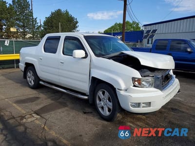 Czwarte zdjęcie samochodu z boku: 2011 HONDA RIDGELINE RTL VIN:5FPYK1F54BB452602 - miniatura