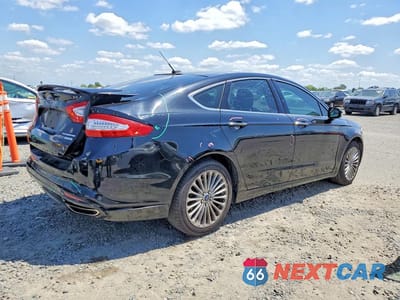 Trzecie zdjęcie samochodu z tyłu: 2016 FORD FUSION TITANIUM VIN:3FA6P0K99GR197882 - miniatura