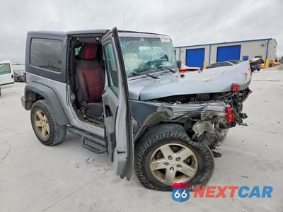 Czwarte zdjęcie samochodu z boku: 2015 JEEP WRANGLER SPORT VIN:1C4GJWAG9FL706711 - miniatura