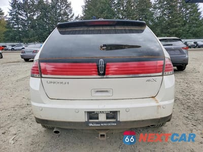 Zdjęcie 6 z 13 samochodu: 2010 LINCOLN MKX VIN:2LMDJ6JC8ABJ24589 - miniatura