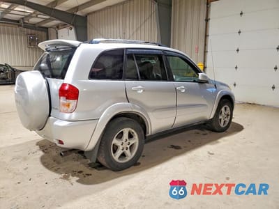 Trzecie zdjęcie samochodu z tyłu: 2002 TOYOTA RAV4 BASE VIN:JTEHH20V426038619 - miniatura