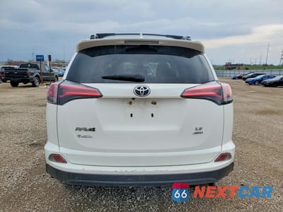 Zdjęcie 6 z 13 samochodu: 2018 TOYOTA RAV4 LE VIN:JTMBFREV2JJ226780 - miniatura