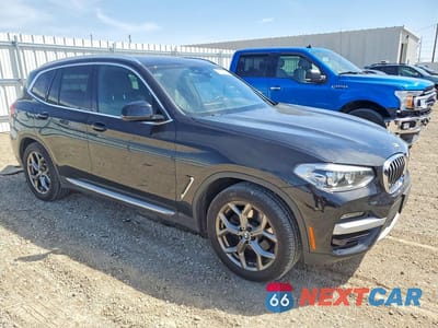 Czwarte zdjęcie samochodu z boku: 2021 BMW X3 SDRIVE30I VIN:5UXTY3C05M9E03512 - miniatura