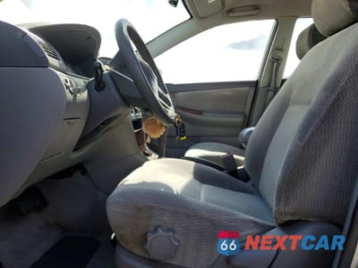 Zdjęcie 7 z 11 samochodu: 2003 TOYOTA COROLLA LE VIN:1NXBR32E13Z033879 - miniatura