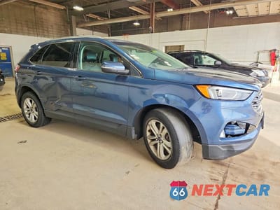 Czwarte zdjęcie samochodu z boku: 2019 FORD EDGE SEL VIN:2FMPK4J99KBC03382 - miniatura