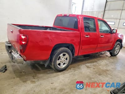Trzecie zdjęcie samochodu z tyłu: 2011 GMC CANYON SLE VIN:1GTD5MF92B8100055 - miniatura